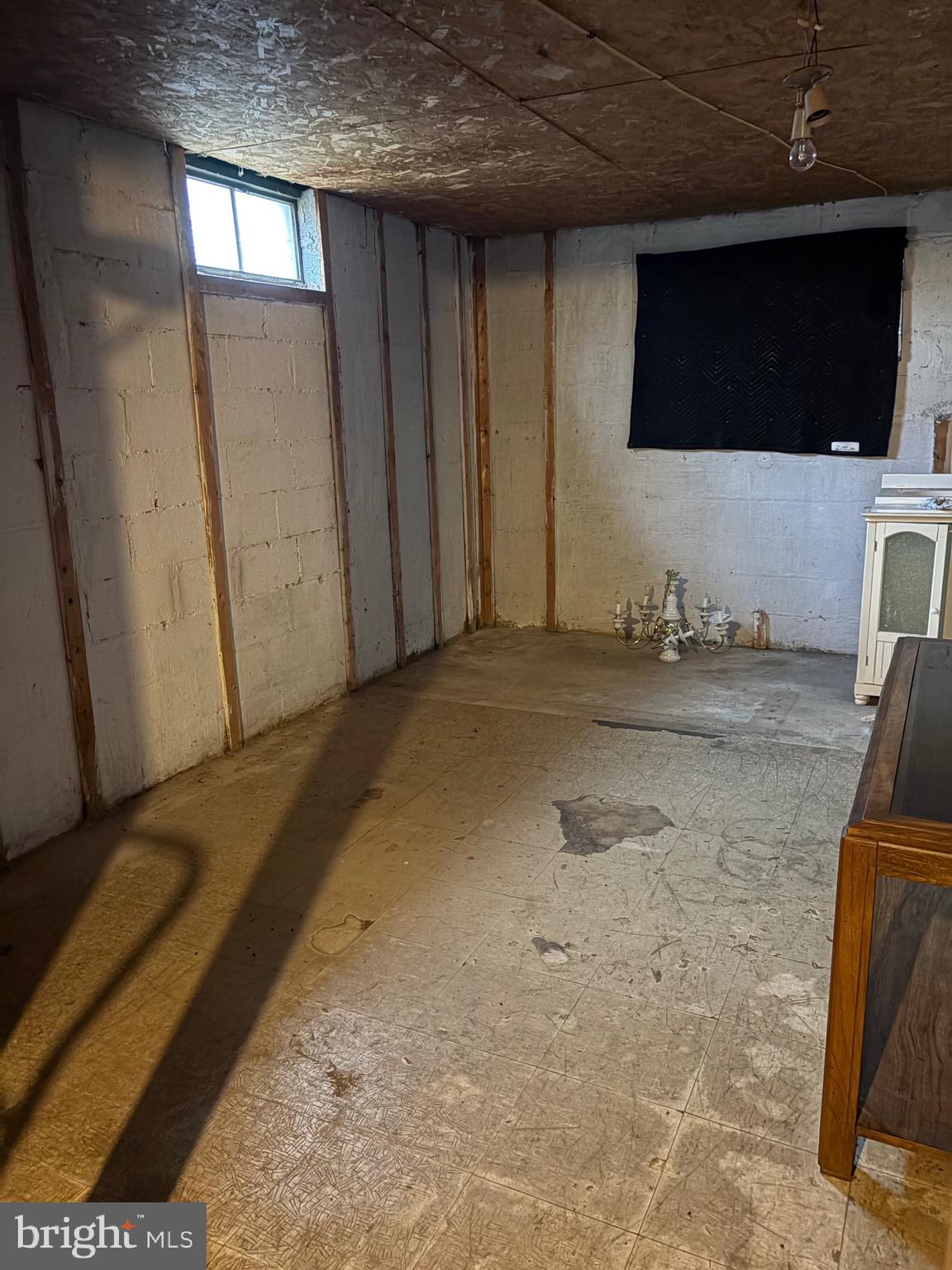 2385 Allensville Road Hedgesville, WV 25427 - Photo 24 of 24 a view of a livingroom with wooden floor and a flat screen tv