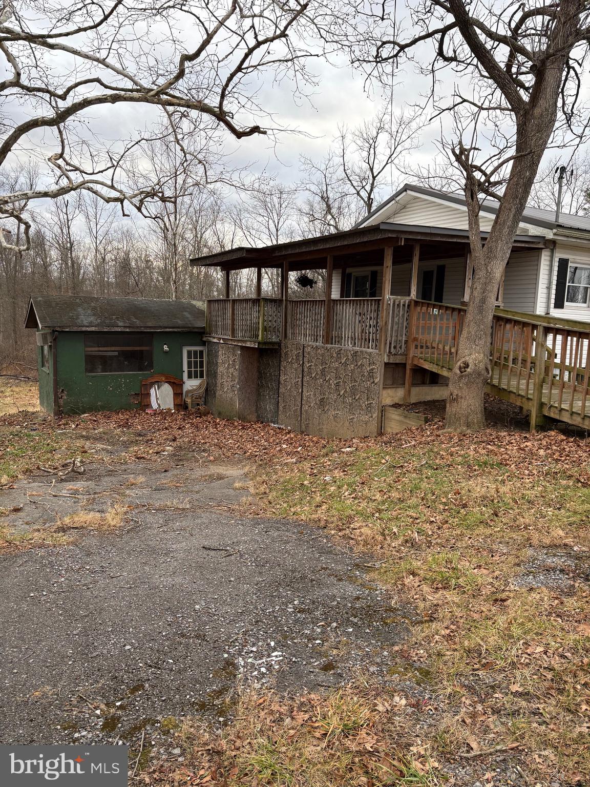 2385 Allensville Road Hedgesville, WV 25427 - Photo 3 of 24 a front view of a house with garden