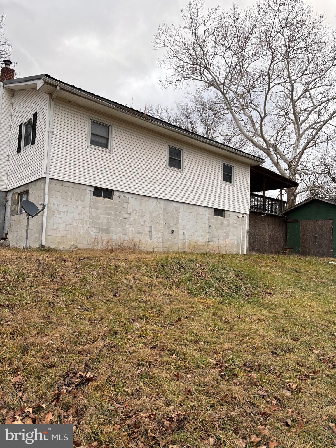 2385 Allensville Road Hedgesville, WV 25427 - Photo 6 of 24 a house with yard