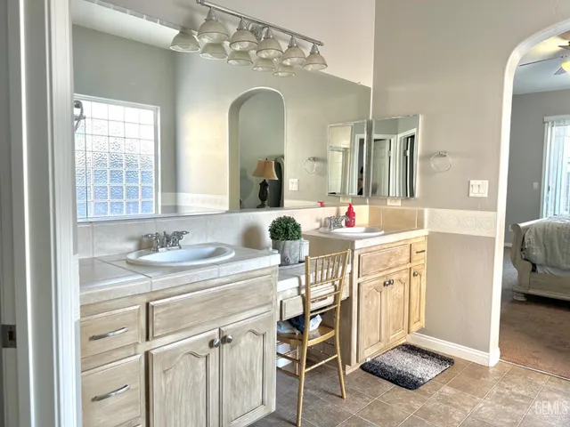 a bath tub sitting next to a window