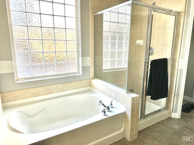 a outdoor living space with patio furniture and potted plants