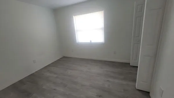 an empty room with a window