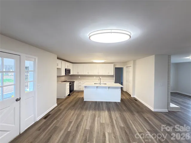 a view of kitchen and living room
