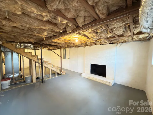 a view of road with large trees
