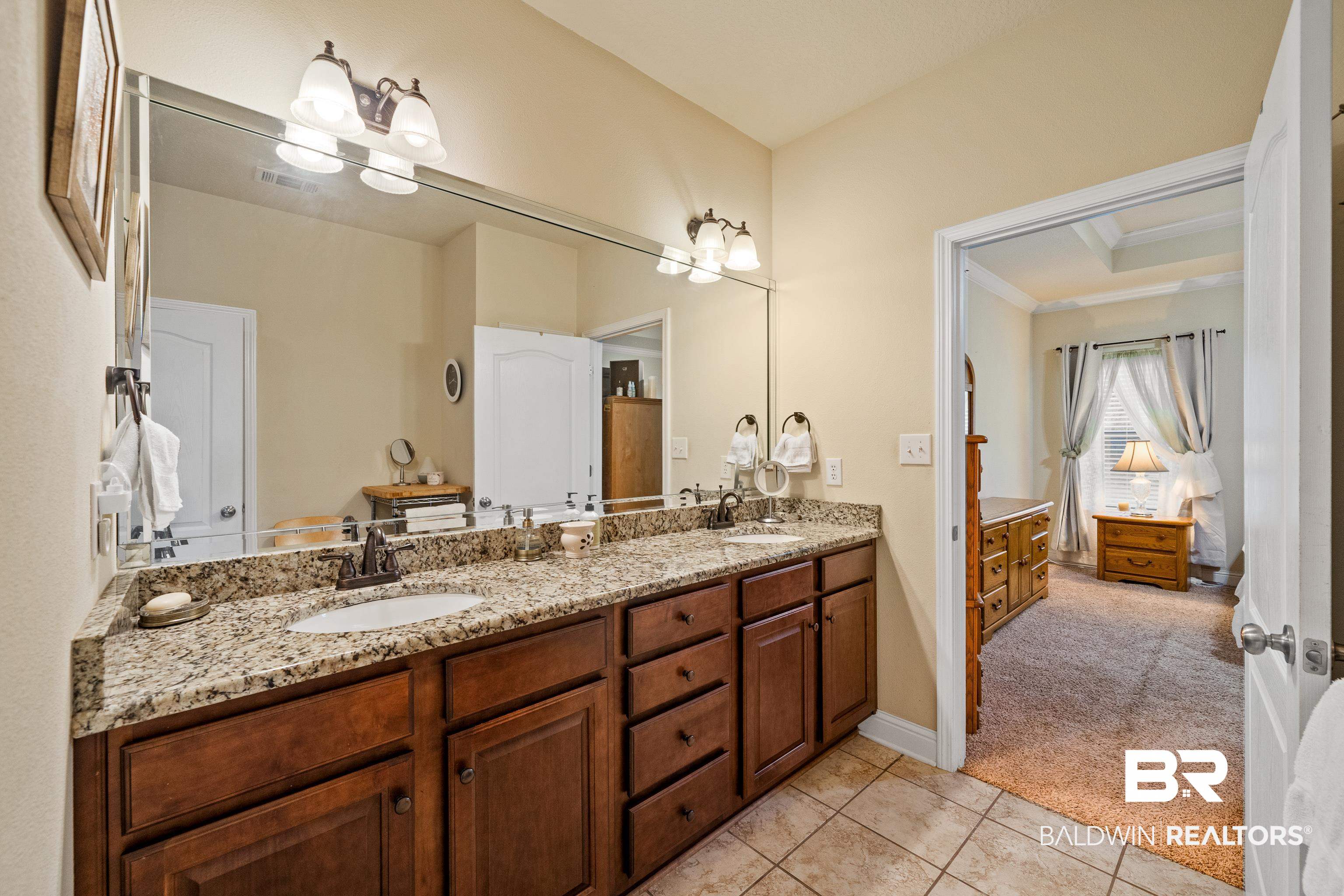 9115 Krystal Ridge Court Daphne, AL 36526 - Photo 23 of 39 Bathroom with tile patterned floors and vanity