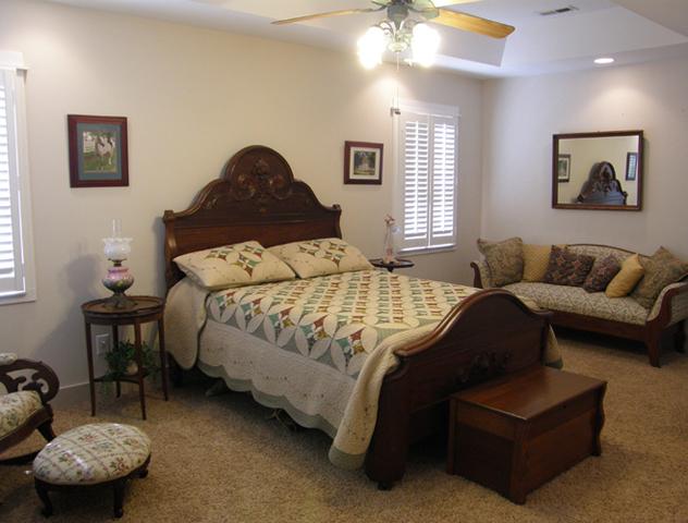 1330 Milltown Road Lewisburg, TN 37091 - Photo 11 of 17 The second bedroom upstairs is also a suite. It has a trey ceiling, gorgeous views of the farm, sitting areas and a built-in dressing table with sink. It shares a Jack and Jill bath with the third bedroom.