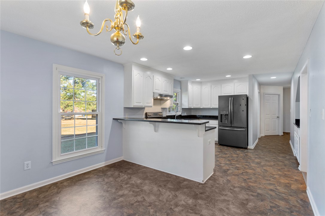 108 Ora Lane Anderson, SC 29625 - Photo 12 of 40 This bright kitchen features ample counter space and offers a seamless blend of style and functionality.