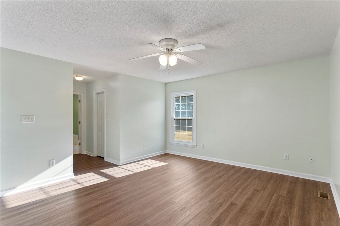 108 Ora Lane Anderson, SC 29625 - Photo 15 of 40 This airy room features durable flooring, ample natural light, and a refreshing ceiling fan.