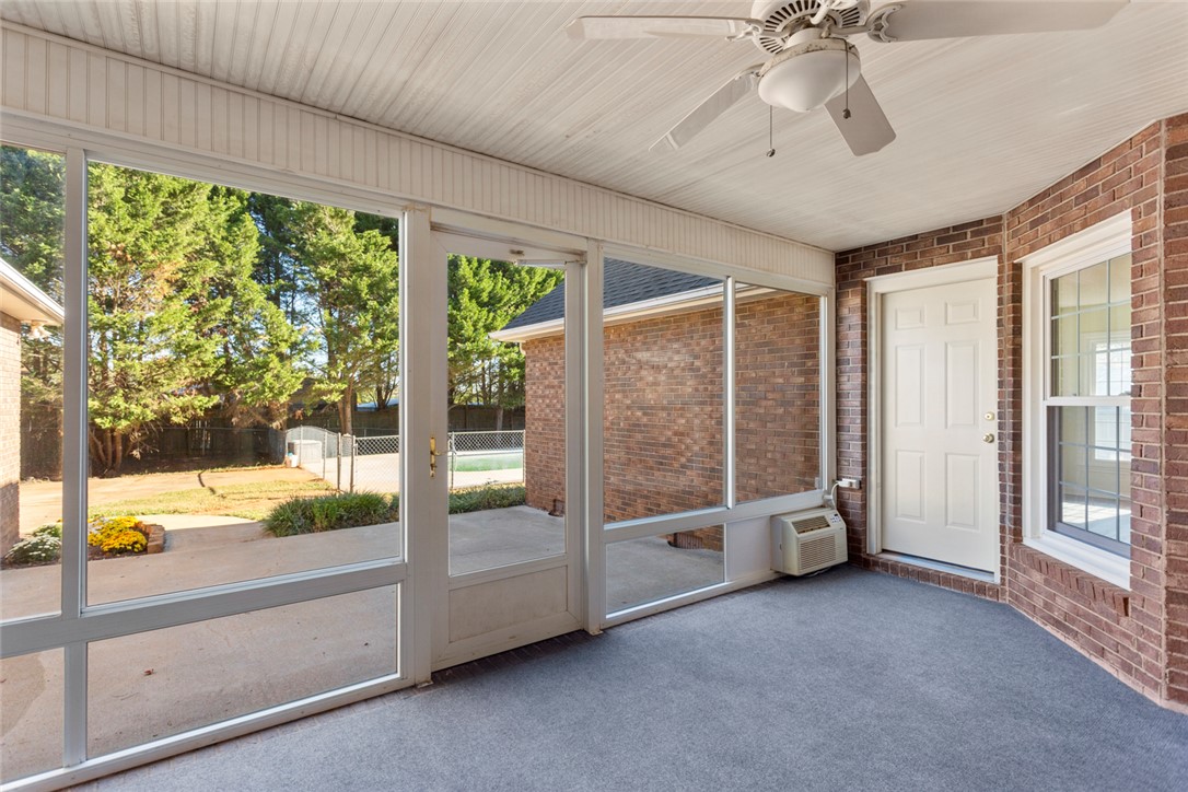 108 Ora Lane Anderson, SC 29625 - Photo 31 of 40 This bright sunroom with brick accents provides a delightful indoor-outdoor living experience.