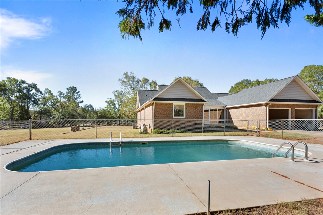 108 Ora Lane Anderson, SC 29625 - Photo 36 of 40 This spacious property offers a serene outdoor oasis with a refreshing pool.