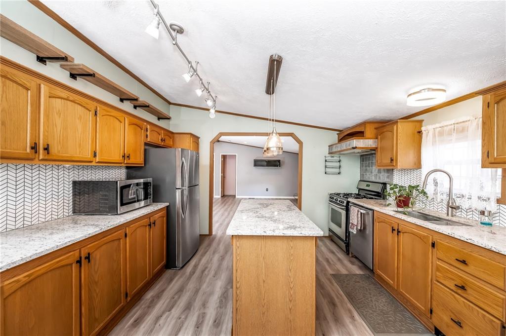 1726 Getty Avenue Indiana, PA 15701 - Photo 12 of 42 Kitchen island adds space for preparing meals and storage.