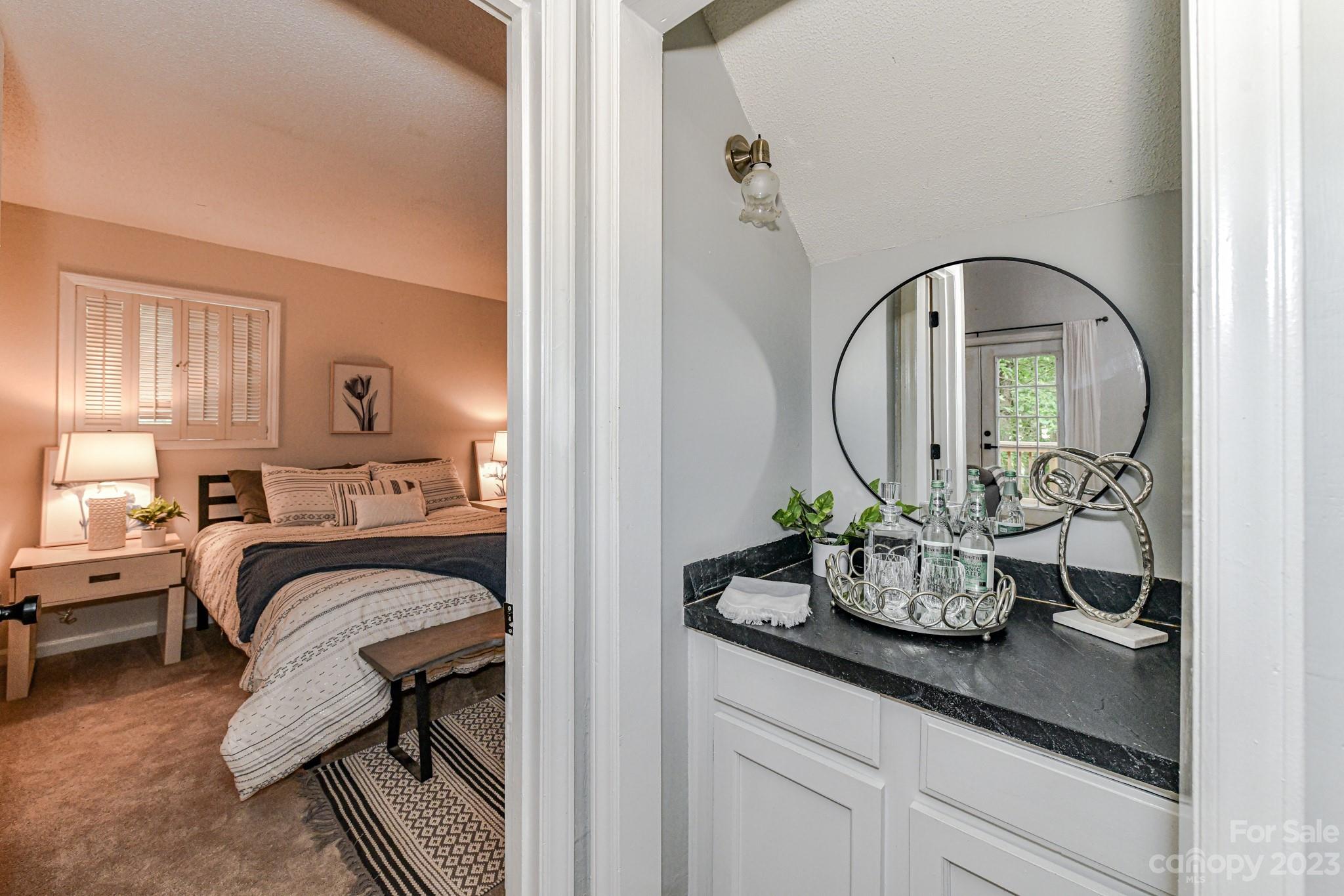 27046 Tidal Way Tega Cay, SC 29708 - Photo 12 of 20 a living room with furniture and a potted plant