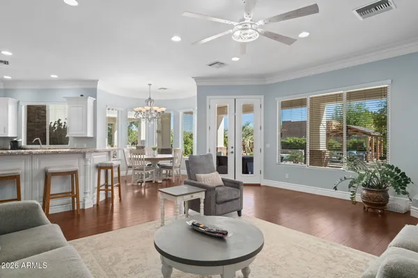 an aerial view of a house with outdoor space and lake view