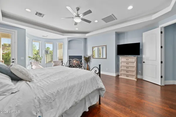 a view of a swimming pool with a lounge chairs
