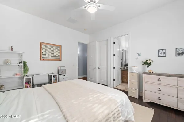 a view of a field of grass and trees