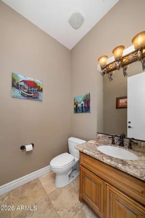 a view of a pathway with a garden