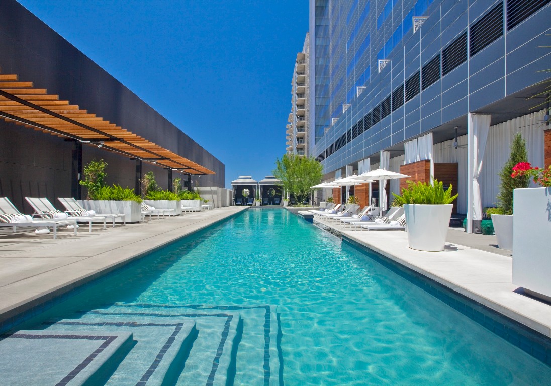 210 Lavaca Street, Unit 1809 Austin, TX 78701 - Photo 27 of 32 Community pool featuring a patio