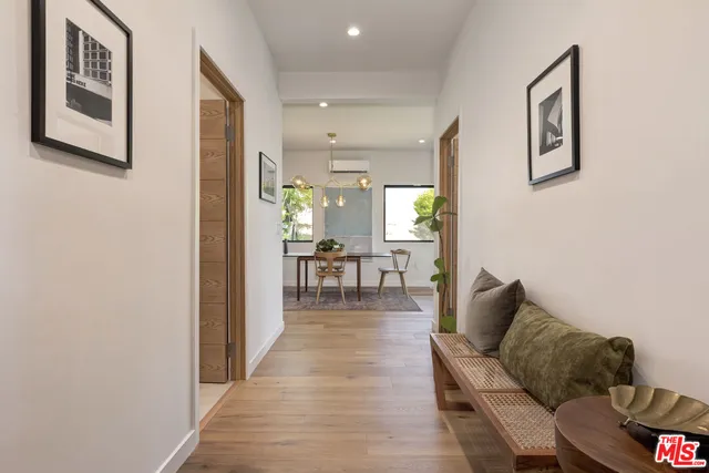 a view of a dining room with furniture and window