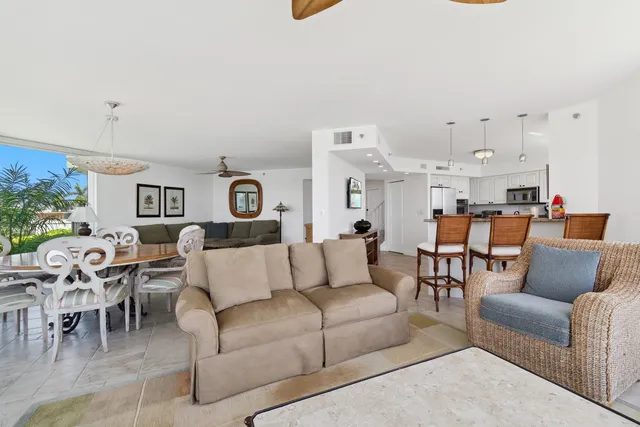 a living room with furniture and a view of living room