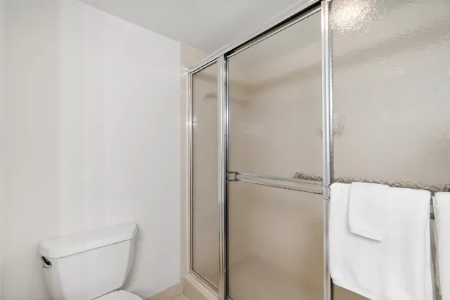 an aerial view of a building with a garden