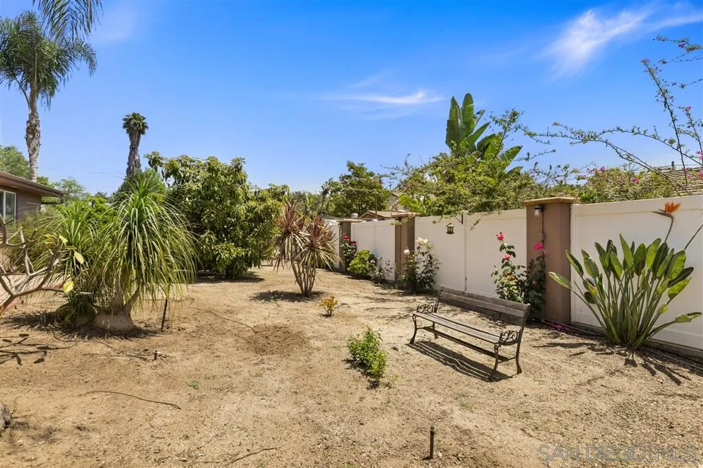 1021 Hillcrest View Lane Fallbrook, CA 92028 - Photo 3 of 24 a view of a backyard with a patio