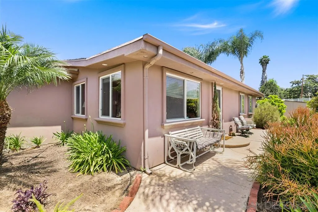 1021 Hillcrest View Lane Fallbrook, CA 92028 - Photo 4 of 24 a view of house with backyard and outdoor seating