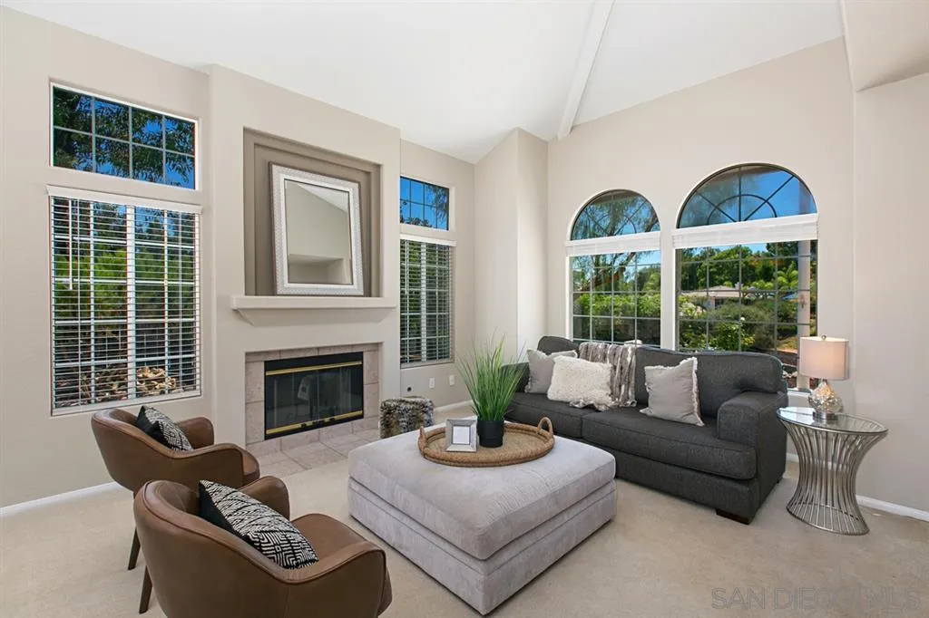13615 Sunset View Road Poway, CA 92064 - Photo 3 of 24 a living room with furniture and a fireplace
