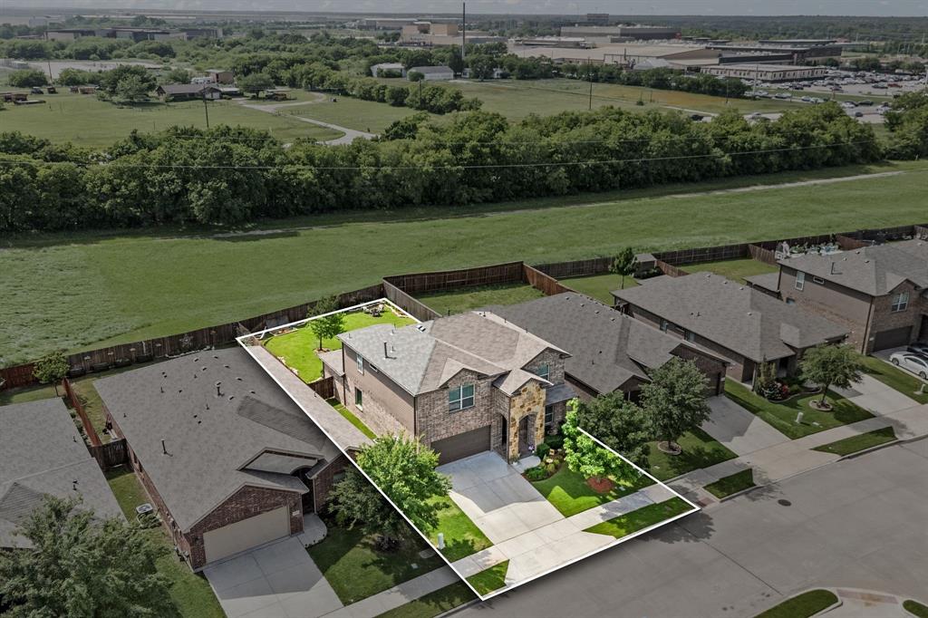 15817 White Mill Road Fort Worth, TX 76177 - Photo 2 of 27 an aerial view of a house with a garden