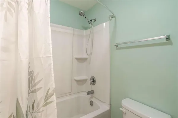 a utility room with washer and dryer