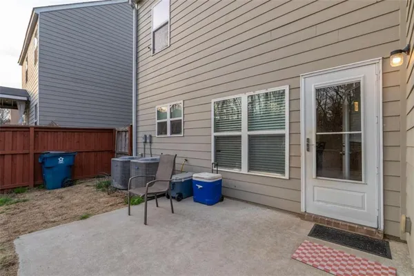 a view of a backyard with swings
