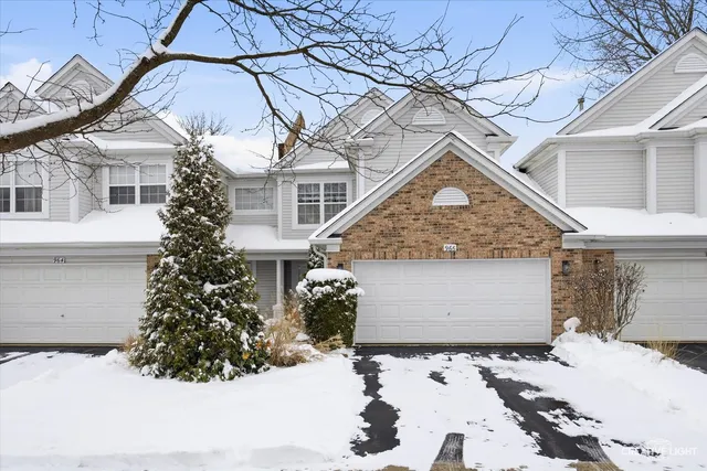 a view of a house with a snow