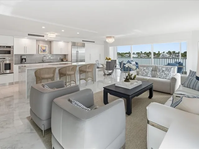 a large kitchen with a large window