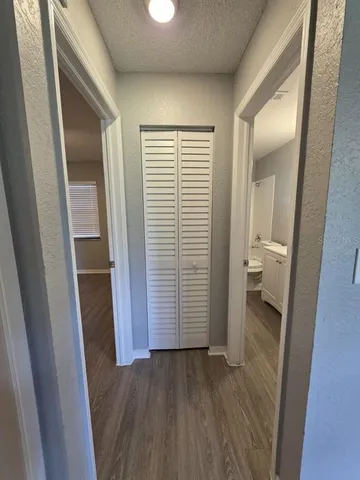 a view of a bathroom from a hallway