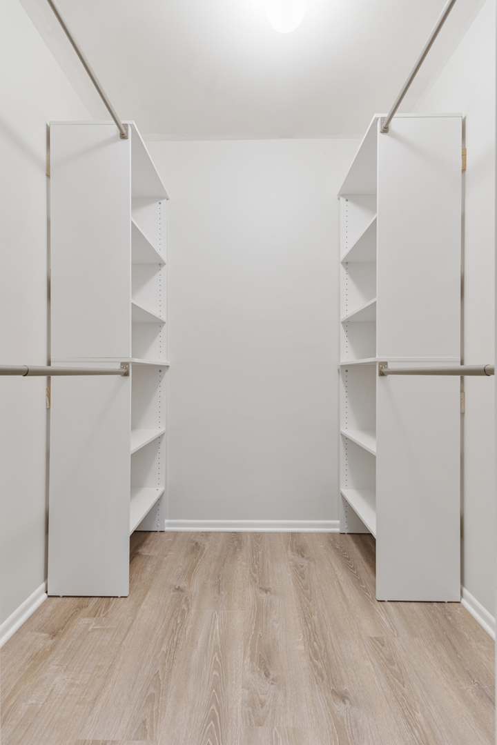 40 South Victoria Lane, Unit G Streamwood, IL 60107 - Photo 13 of 22 a view of an empty walk in closet