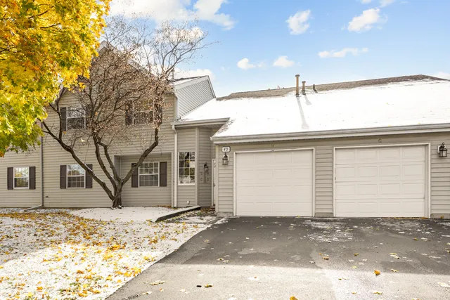 a view of a house with a snow