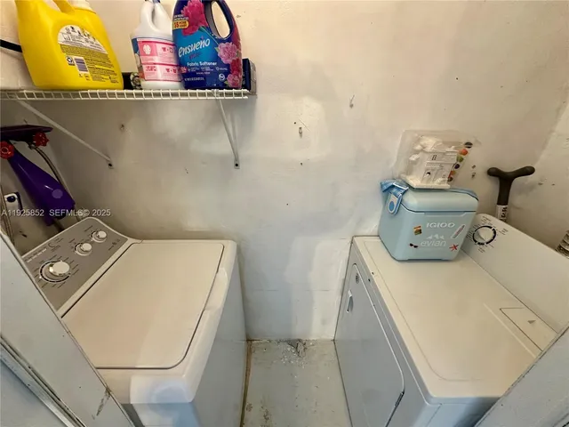 a bathroom with a sink toilet vanity and shower