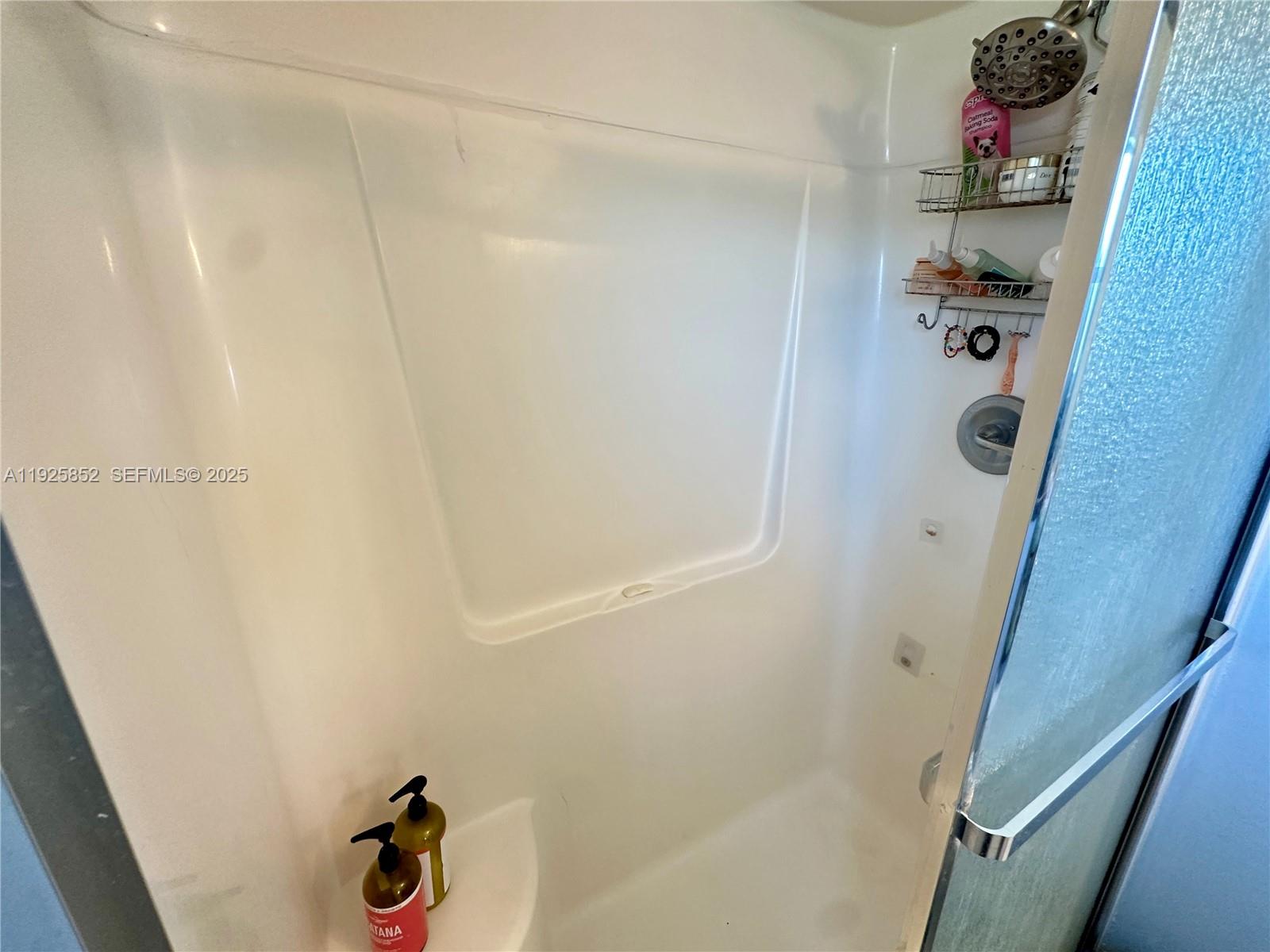 8091 Northwest 12th Street, Unit A Margate, FL 33063 - Photo 34 of 70 a bathroom with a bathtub and shower