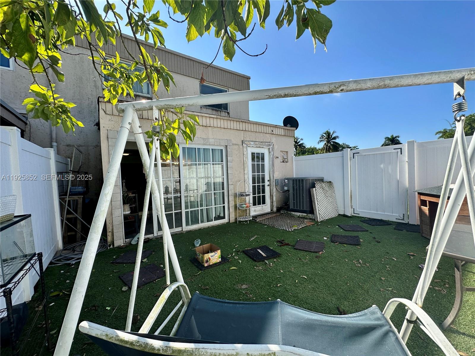 8091 Northwest 12th Street, Unit A Margate, FL 33063 - Photo 51 of 70 a view of an chairs and table in the patio
