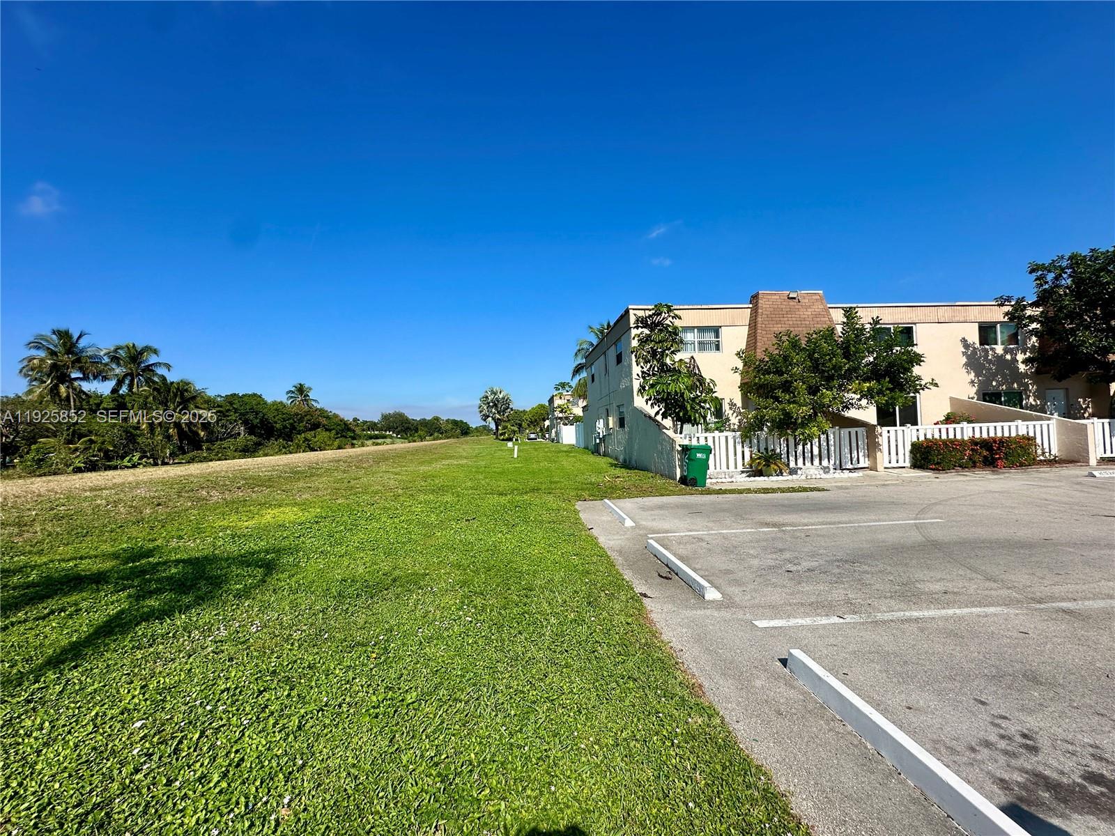 8091 Northwest 12th Street, Unit A Margate, FL 33063 - Photo 55 of 70 a view of a street with a building in the background