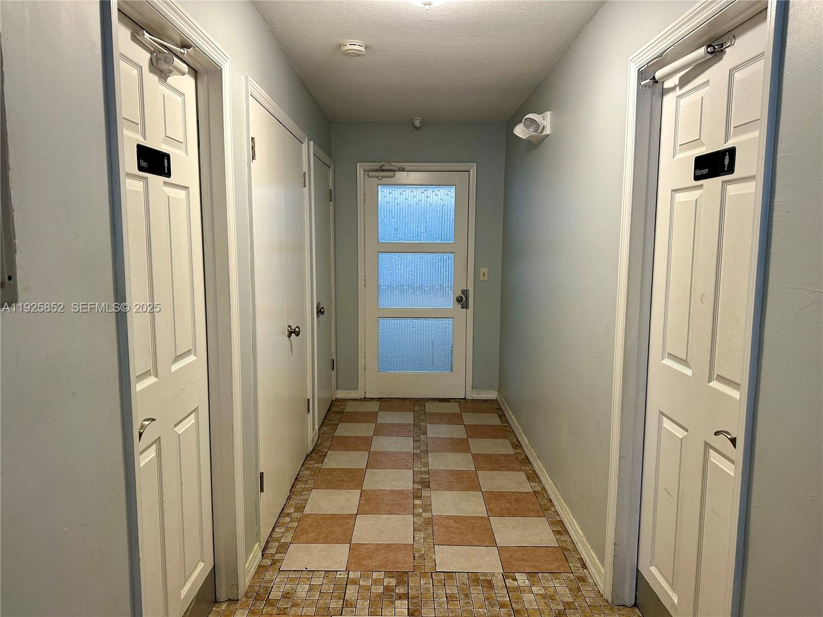 8091 Northwest 12th Street, Unit A Margate, FL 33063 - Photo 65 of 70 a view of hallway with windows