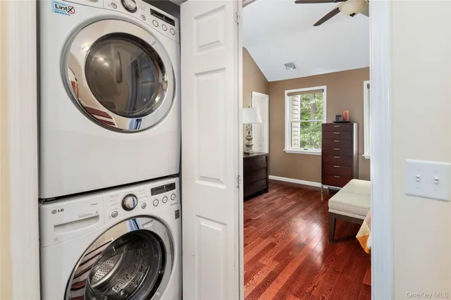 a view of a hallway with washer and dryer