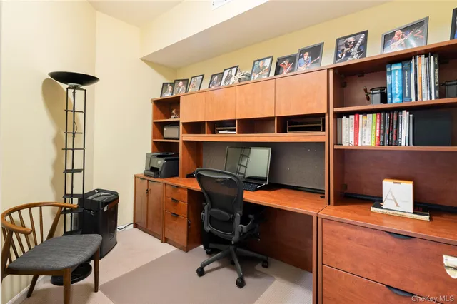 a view of a workspace with furniture