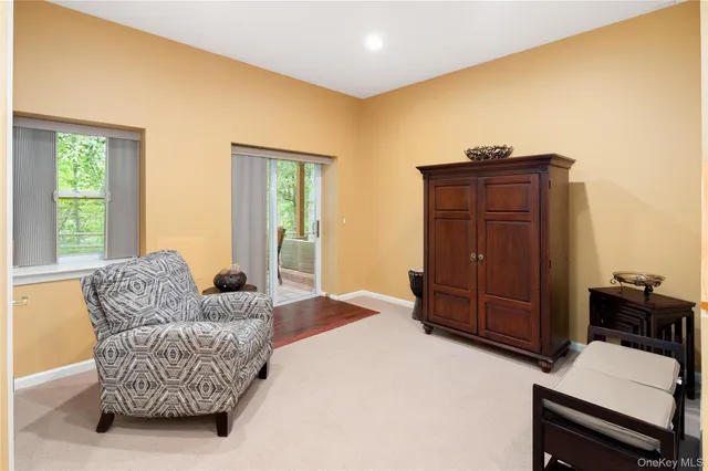 a bedroom with a bed and dresser