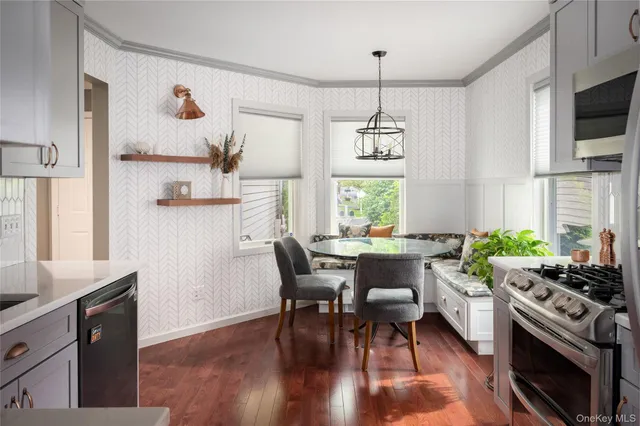 a kitchen with a table and chairs in it