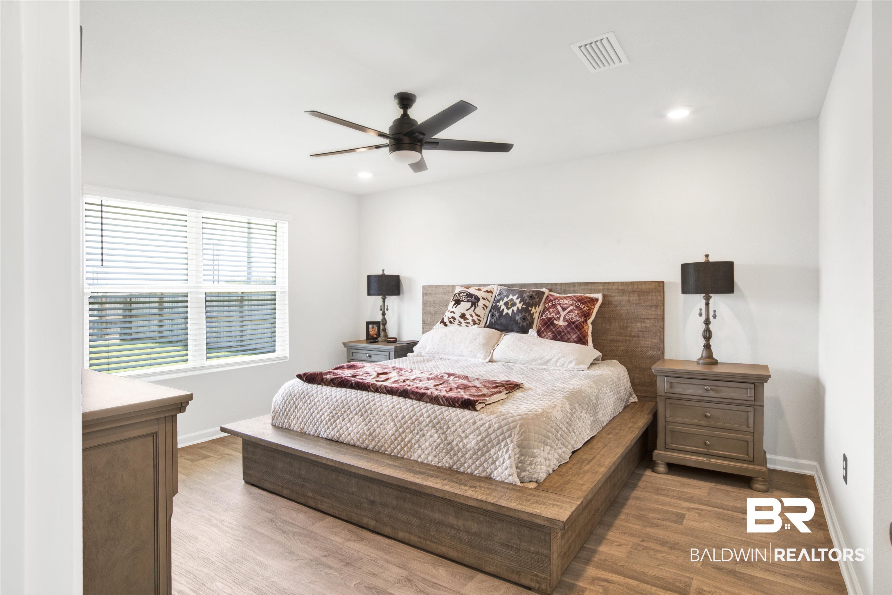 14731 Forsythia Loop Silverhill, AL 36576 - Photo 5 of 25 Bedroom featuring hardwood / wood-style flooring and ceiling fan
