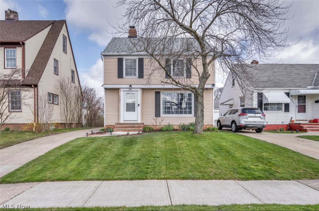 12821 Havana Road Cleveland, OH 44125 - Photo 2 of 41 View of front of home with a front lawn
