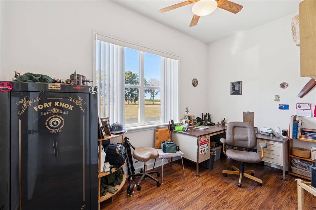 2307 Cass Road Lake Alfred, FL 33850 - Photo 15 of 67 a view of a workspace with furniture and a window