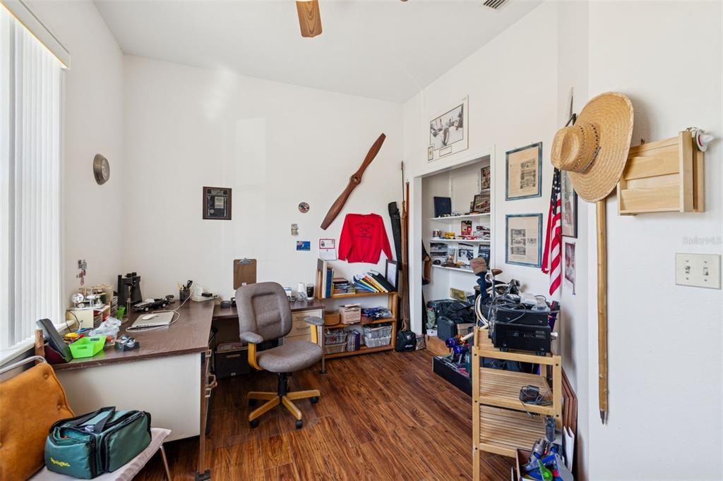 2307 Cass Road Lake Alfred, FL 33850 - Photo 16 of 67 a living room with furniture and a wooden floor