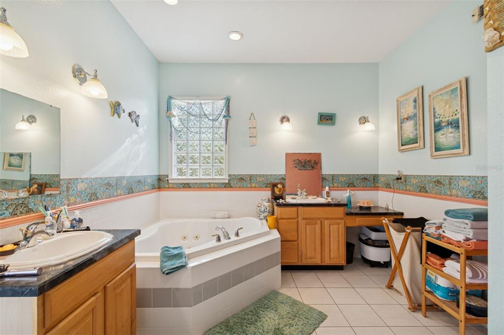 2307 Cass Road Lake Alfred, FL 33850 - Photo 22 of 67 a kitchen with a stove a sink and a refrigerator