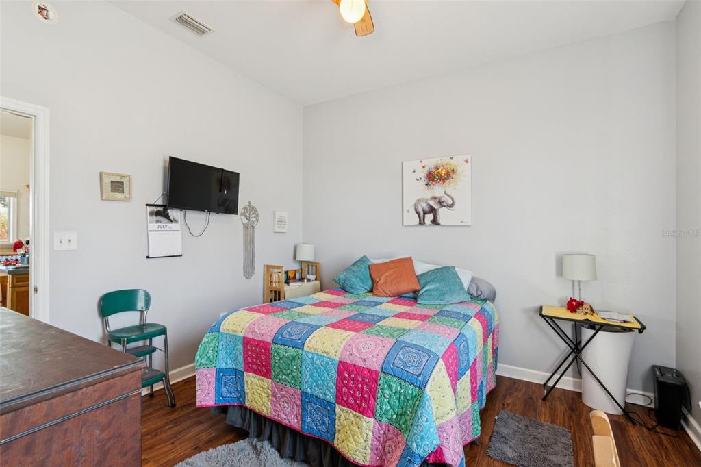 2307 Cass Road Lake Alfred, FL 33850 - Photo 39 of 67 a bedroom that has a bed and a flat screen tv